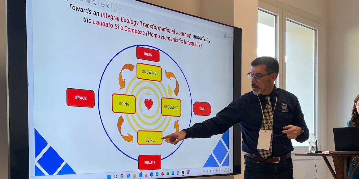 Dr. Canadas presenting at the Economy of Francesco event