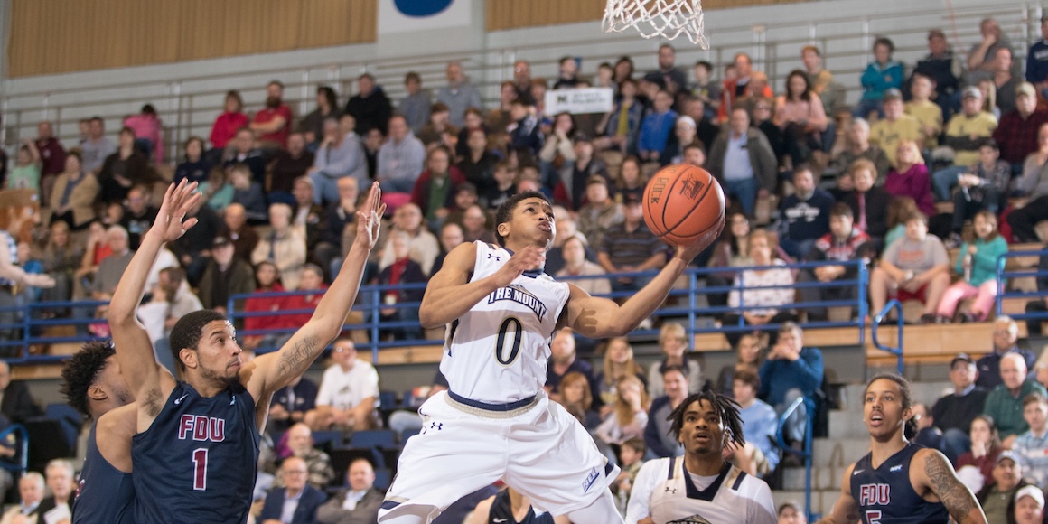 junior robinson extends for layup vs fdu